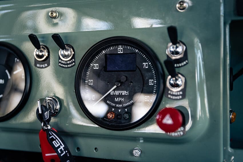 Up front, it is more of a ‘nuts and bolts’ vibe, with a cold metal dash which features all the original gauges and dials, which have been upgraded for range and charging