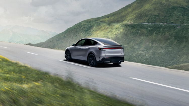 2025 Tesla Model Y Performance driving image