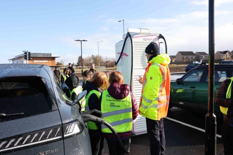 inshes primary school pupils at the new ionity inverness charging site
